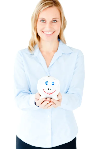 Charming businesswoman holding a piggy-bank — Stock Photo, Image