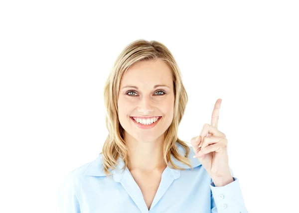 Yukarı işaret parmağıyla iş kadını gülümseyen — Stok fotoğraf
