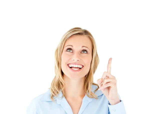 Jolly young woman pointing upward isolated — Stock Photo, Image