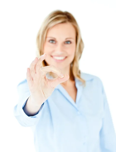 Confident young businesswoman showing OK sign — Stock Photo, Image
