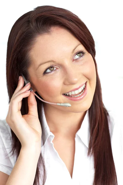 Cheerful young businesswoman with earpiece — Stock Photo, Image