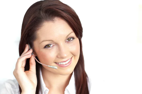 Delighted young businesswoman wearing headphones — Stock Photo, Image