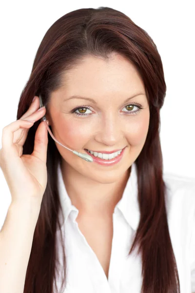 Merry young businesswoman wearing headphones — Stock Photo, Image