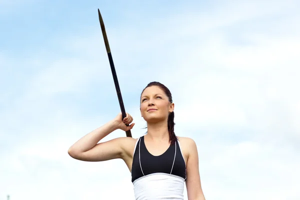 stock image Female athlete throwing the javelin