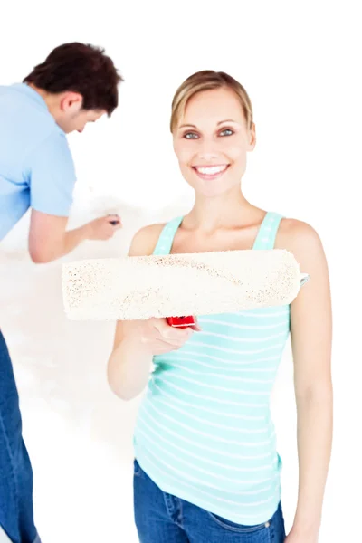 Beautiful couple painting a room — Stock Photo, Image
