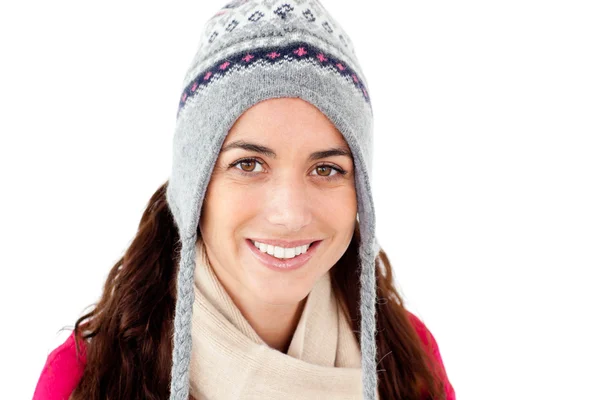 Happy woman wearing winter clothes smiling against — Stockfoto