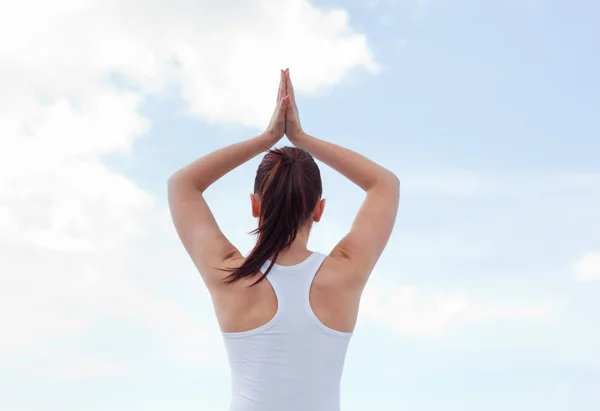 Young attractive woman doing yoga — Stock Photo, Image