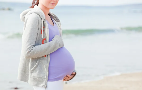 Těhotné mladá žena — Stock fotografie