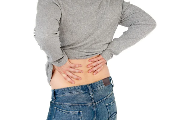 Close-up de um jovem com dor nas costas — Fotografia de Stock