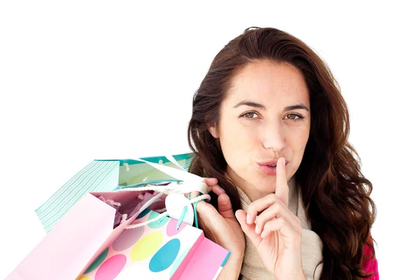Hispanic woman wearing a scarf and holding shopping bags — Stock Photo, Image