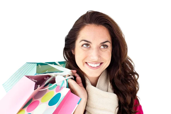 Donna ispanica sorridente che tiene borse della spesa — Foto Stock