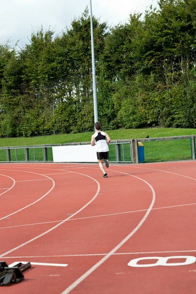 Sportig manliga sprinter utbildning — Stockfoto