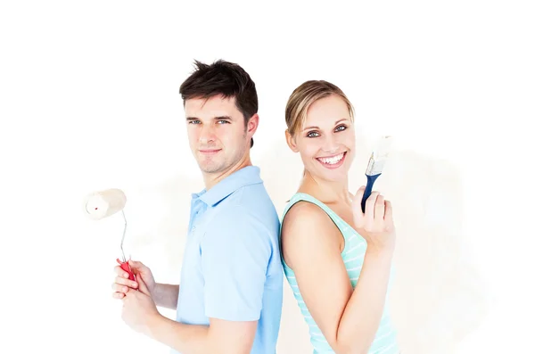 Charismatisches Paar beim Bemalen eines Zimmers — Stockfoto