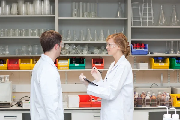 Serious scientists thinking — Stock Photo, Image