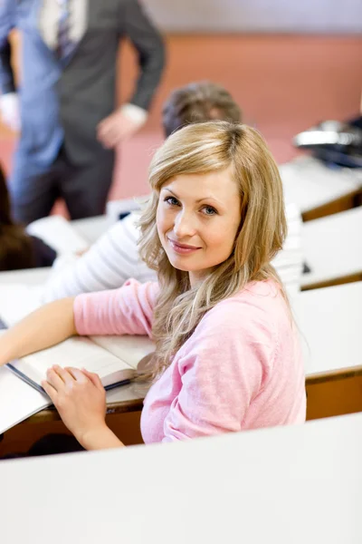 Portrait of a caucasian female student during a university lesso — Stock Photo, Image