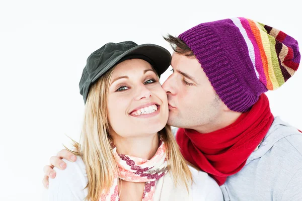 Beautiful woman receiving a kiss from her boyfriend wearing both — Stock Photo, Image