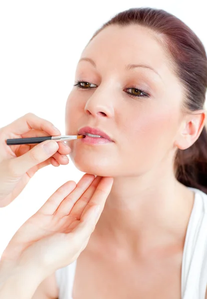 Close-up of a proud woman being made-up by a professional artist — Stock Photo, Image