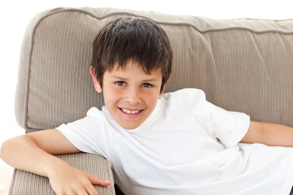Portrait of an adorable child relaxing on the sofa — Stock Photo, Image