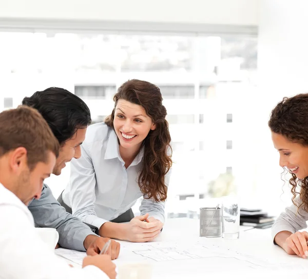 Happy female architect with her team during a meeting — Stock Photo, Image