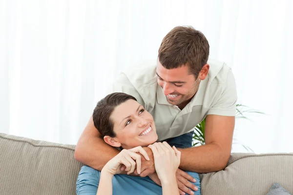 Portrait of an adorable couple together in the living room — Stock Photo, Image