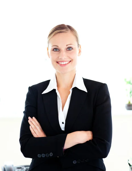 Confident young businesswoman looking at the camera Stock Picture
