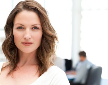 Portrait of a charismatic woman at a meeting clipart