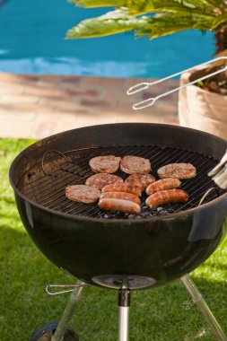 A barbecue in the garden clipart