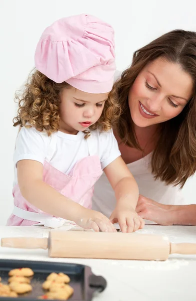 Little girl preparing a daught with her mother — Stock Photo, Image