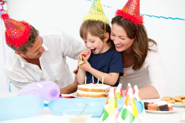 Happy parents celebrating their son's birthday — Stock Photo, Image