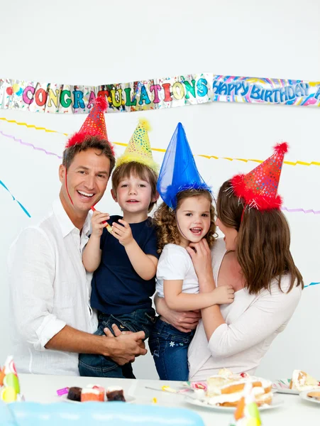 Portrait of parents with their children during a birthday party — Stock Photo, Image