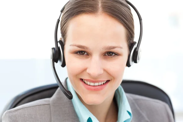 Portrait of a friendly operator with earpiece — Stock Photo, Image