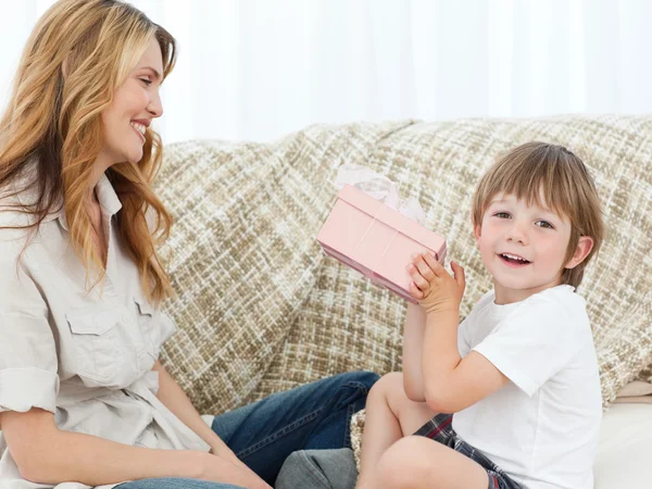 Happy children with his gift — Stock Photo, Image