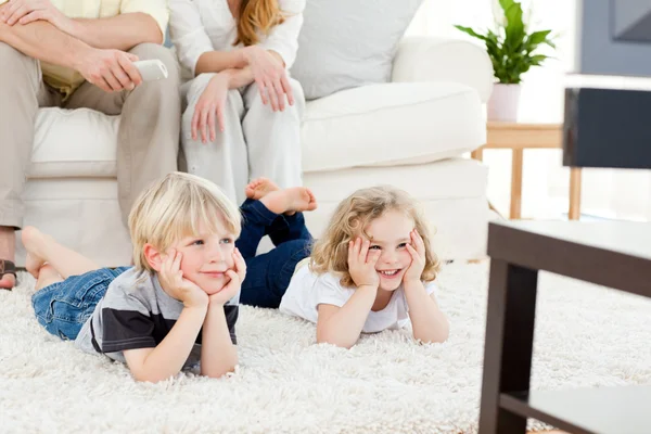 Adorable family watching tv — Stock Photo, Image