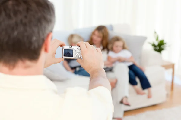 Man taking a photo of his family — Stock Photo, Image