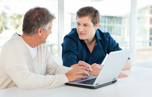 Two businessman working on their laptop — Stock Photo, Image