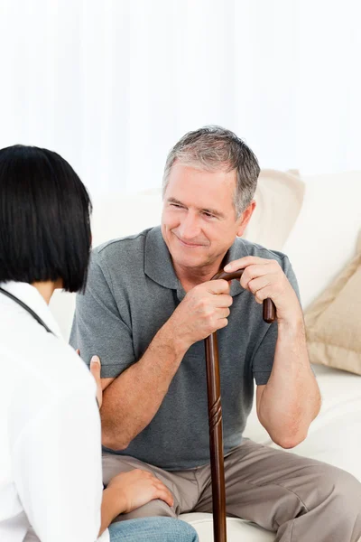 Retired man with his nurse — Stock Photo, Image