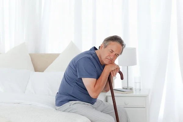 Retired man with his walking stick — Stock Photo, Image