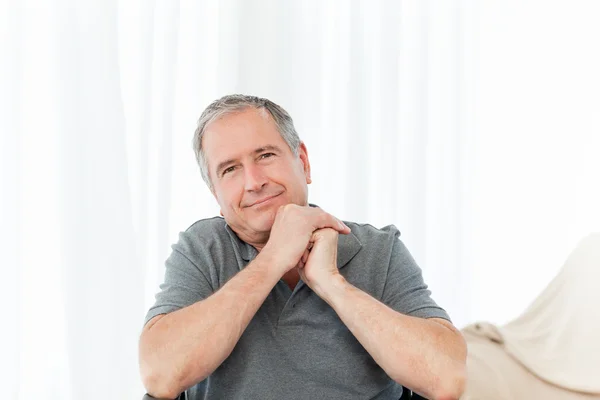 Senior in his wheelchair looking at the camera — Stock Photo, Image