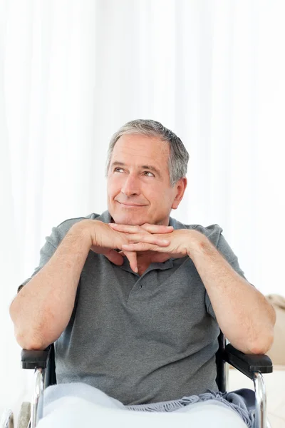 Retired man in his wheelchair — Stock Photo, Image