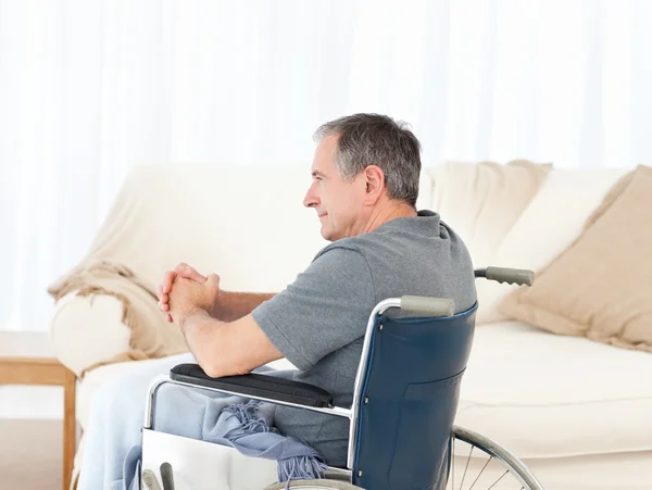 Retired man in his wheelchair — Stock Photo, Image