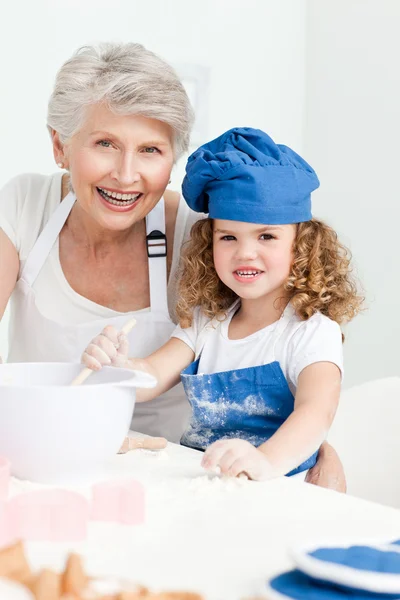stock image A little girl with her grandmother looking at the camera