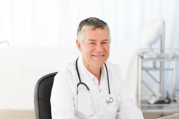 A senior doctor in his office — Stock Photo, Image