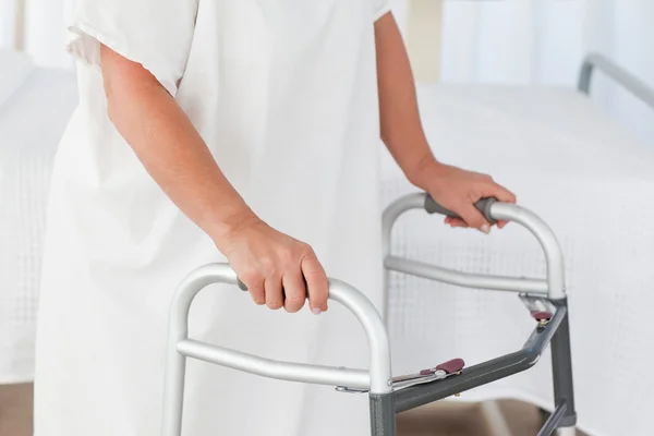 Senior woman with her zimmer frame — Stock Photo, Image