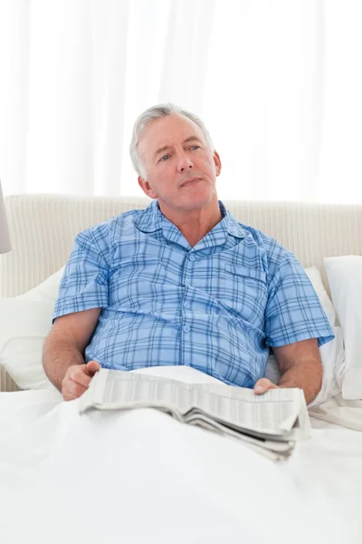 Man thinking in his bed — Stock Photo, Image