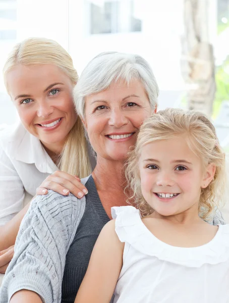 Portrait of a joyful family looking at the camera — Stock Photo, Image
