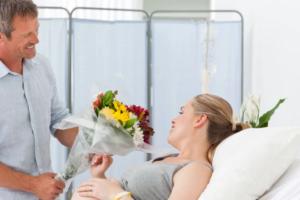 Adorable couple in a hospital room — Stock Photo, Image
