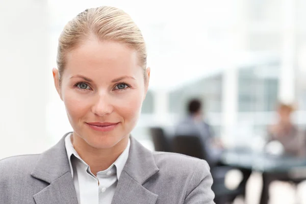 Attractive businesswoman in her office — Stock Photo, Image
