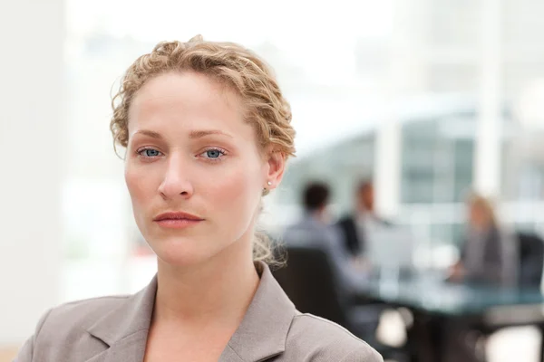 Serious businesswoman in her office — Stock Photo, Image