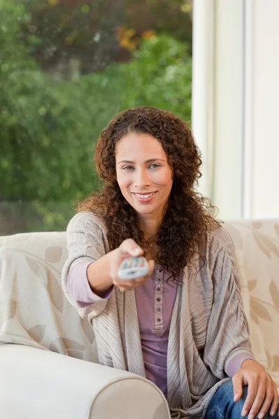 Woman with her remote — Stock Photo, Image