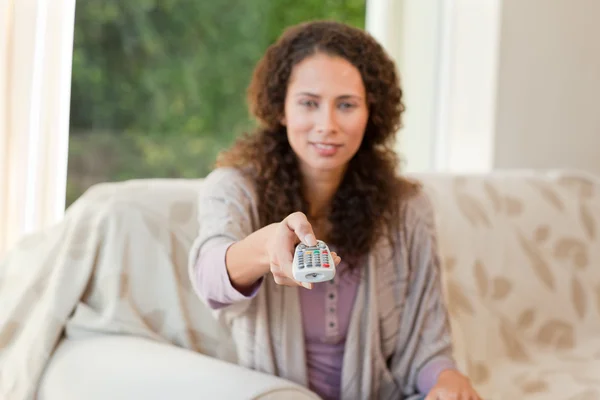 Woman with her remote — Stock Photo, Image